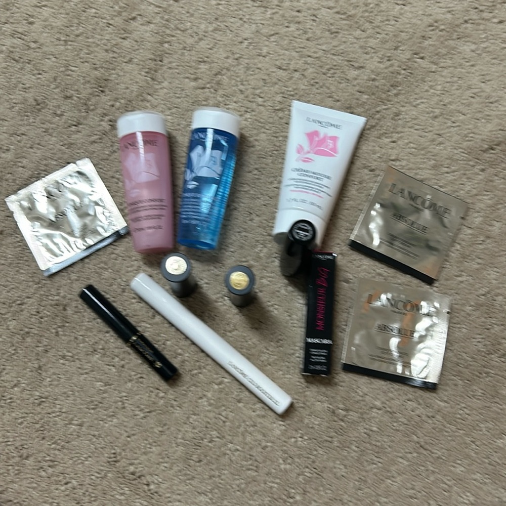 Lancôme skincare samples and lipsticks with cosmetics bag
